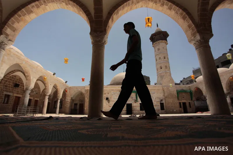 Palestinian muslims pray at mosque during the Muslims fasting month of Ramadan in Gaza city, on June 30, 2014. Muslims around the world refrain from eating, drinking and sexual intercourse from dawn till dusk during Rama...