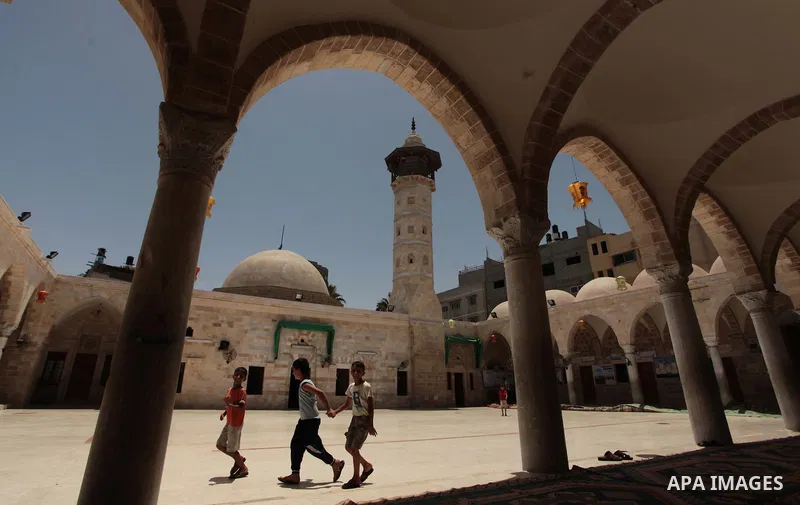 Palestinian muslims pray at mosque during the Muslims fasting month of Ramadan in Gaza city, on June 30, 2014. Muslims around the world refrain from eating, drinking and sexual intercourse from dawn till dusk during Rama...