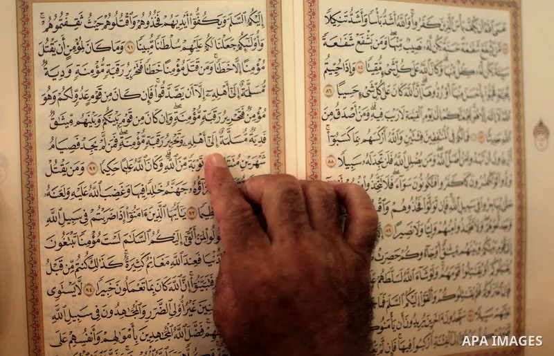 A Palestinian muslim reads the holy Qur'an at mosque in Gaza city, on June 30, 2014. Muslims around the world refrain from eating, drinking and sexual intercourse from dawn till dusk during Ramadan, the holiest month in...