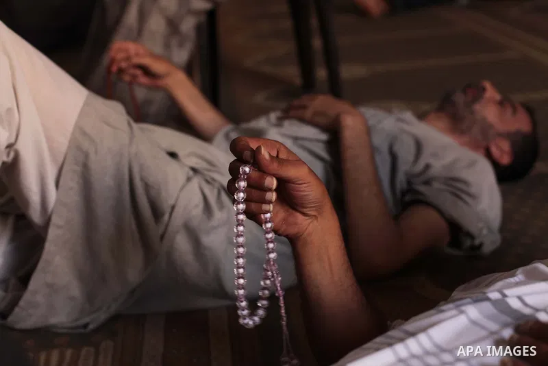 Palestinian muslims sleep at mosque during the Muslims fasting month of Ramadan in Gaza city, on June 30, 2014. Muslims around the world refrain from eating, drinking and sexual intercourse from dawn till dusk during Ram...