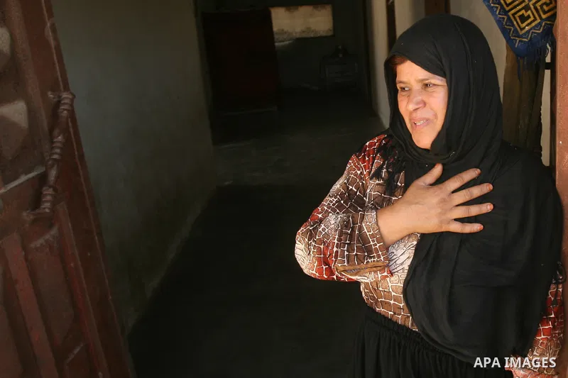 A Palestinian relative mourns the death of a Hamas gunman Mohammed Ebeid during his funeral in Deir El-Balah in the central Gaza Strip June 30, 2014. Israeli forces attacked militant targets in the Gaza Strip on Sunday,...