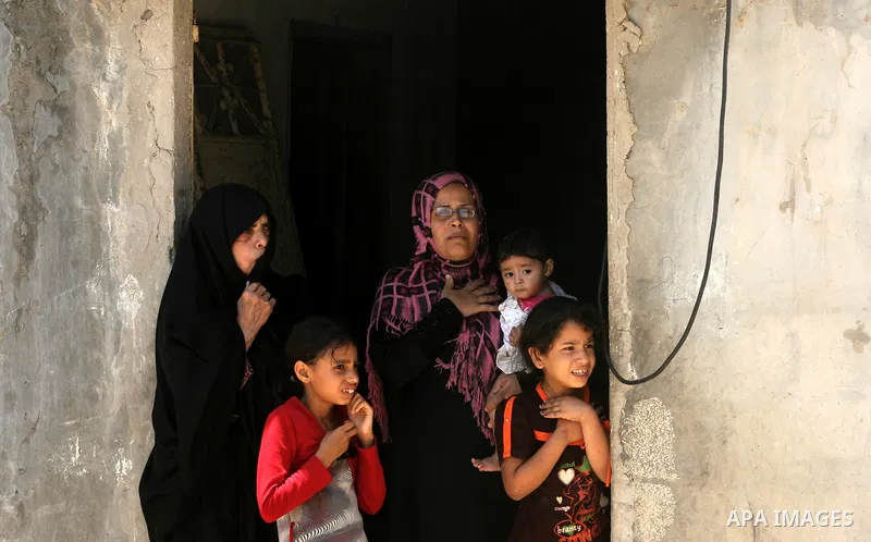 Palestinian women mourn during the funeral of a Hamas gunman Mohammed Ebeid in Deir El-Balah in the central Gaza Strip June 30, 2014. Israeli forces attacked militant targets in the Gaza Strip on Sunday, killing Hamas gu...