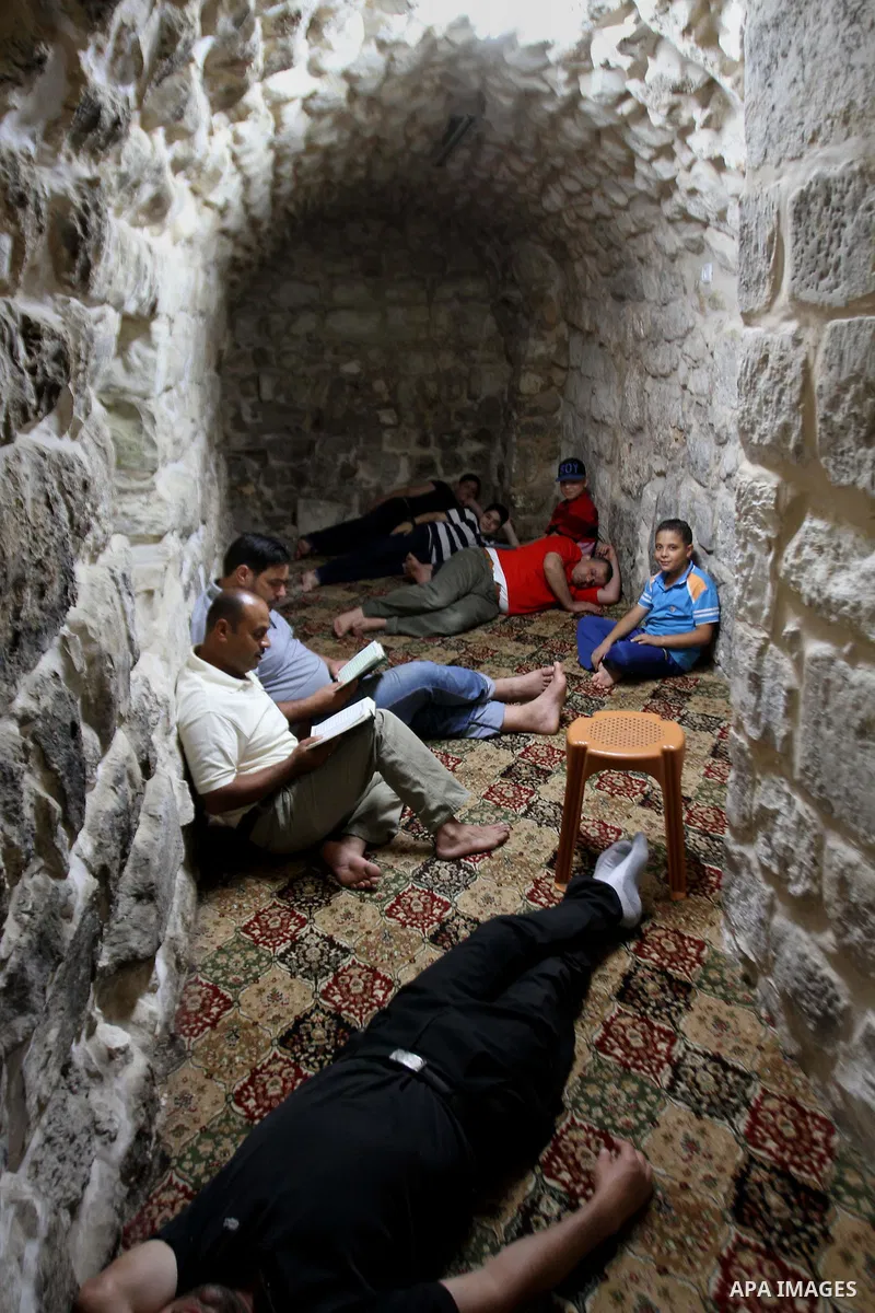 Palestinian muslims read the holy Qur'an at mosque, during the holy month of Ramadan in West Bank City of Nablus, on June 30, 2014. Muslims around the world refrain from eating, drinking and sexual intercourse from dawn...