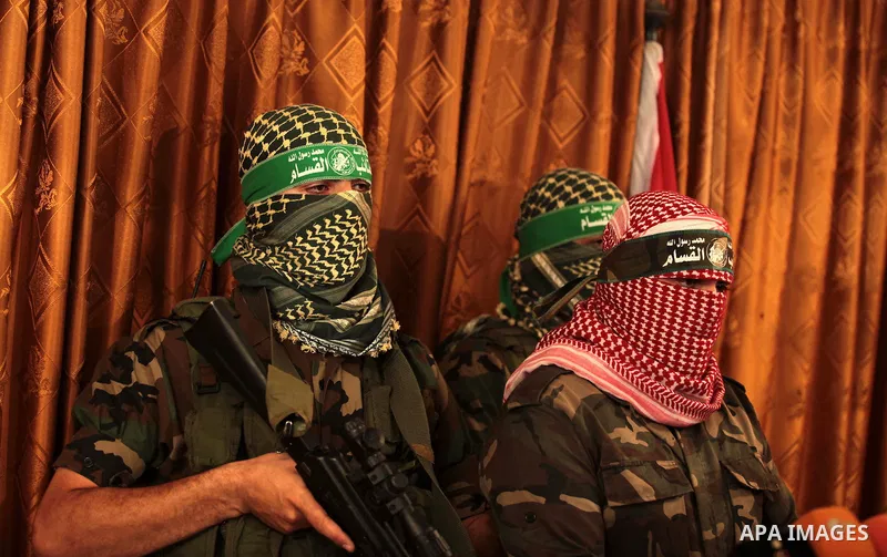 Spokesman of al-Qassam Brigade, the military wing of Hamas movement, Abu Obeida, speaks during a press conference in Gaza city on July 03, 2014. Last night Israel launched some dozen air strikes on northern Gaza and Gaza...