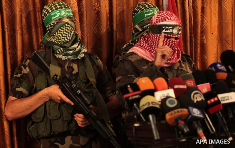 Spokesman of al-Qassam Brigade, the military wing of Hamas movement, Abu Obeida, speaks during a press conference in Gaza city on July 03, 2014. Last night Israel launched some dozen air strikes on northern Gaza and Gaza...