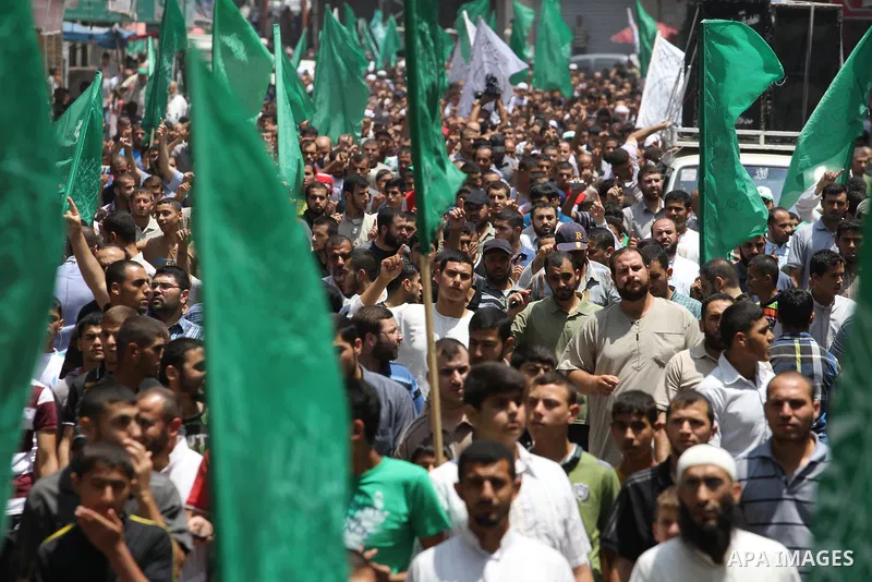 Palestinian supporters of Hamas movement take part in a rally in solidarity with the Palestinian in the West Bank and against any possible Israeli attack on Gaza, in Jabalia in the northern Gaza Strip, July 04, 2014. The...