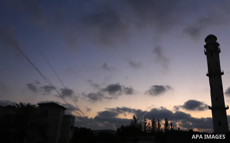 Smoke trails are seen as two rockets are launched from the east Gaza City towards Israel on July 07, 2014. Israeli air strikes on Gaza, that killed at least seven Palestinian militants overnight, came after a day in whic...