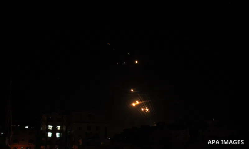 Rockets fired from Gaza City towards southern Israel flares illuminate the sky, July 08, 2014. Israel launched an offensive against the Gaza Strip, conducting a series of fresh airstrikes in response to increasing rocket...