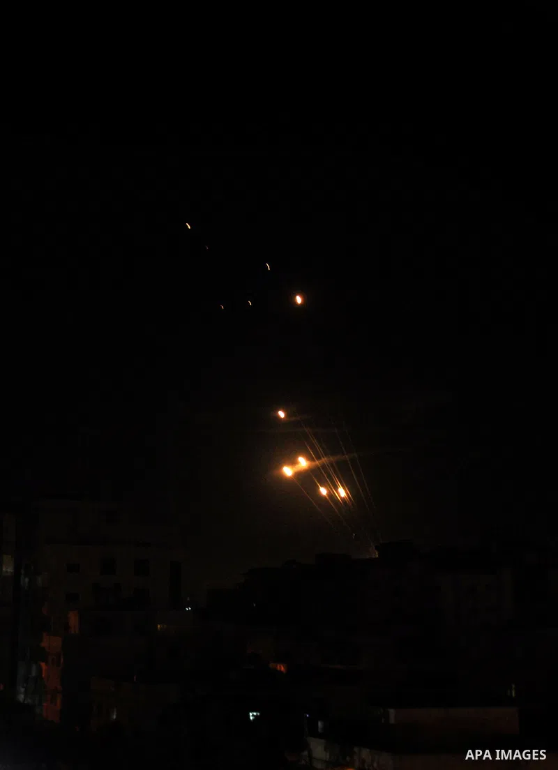 Rockets fired from Gaza City towards southern Israel flares illuminate the sky, July 08, 2014. Israel launched an offensive against the Gaza Strip, conducting a series of fresh airstrikes in response to increasing rocket...
