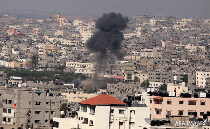 Smoke rises following what Palestinian witnesses said was an Israeli air strike Gaza City on July 10, 2014. At least 74 Palestinians, most of them civilians, have been killed in Israel's Gaza offensive, Palestinian offic...