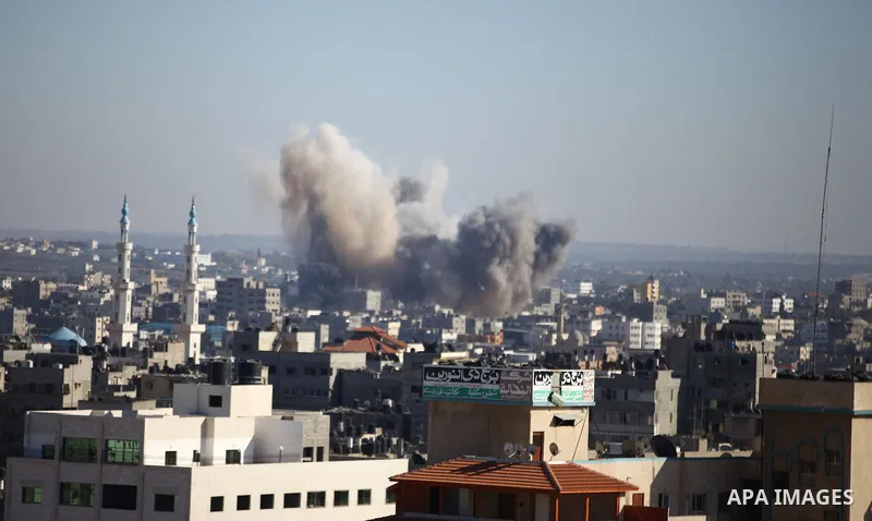 Smoke billows from buildings following an Israeli air strike in Gaza City on July 11, 2014. Israel's aerial bombardment of Gaza claimed its 105th Palestinian life as Hamas pounded central Israel with rockets and Washingt...