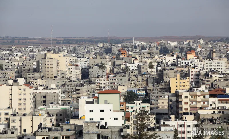 A picture taken on July 12, 2014 shows a general view of buildings in Gaza City. The Palestinian death toll from Israel's Operation Protective Edge hit 165 after its deadliest day, that included a strike that demolished...