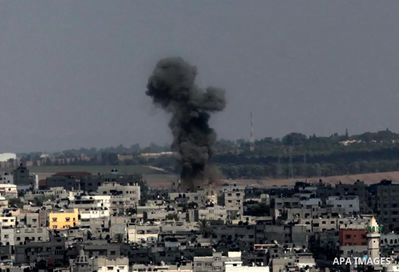 Smoke billows following an Israeli air strike in Gaza City on July 15, 2014. Prime Minister Benjamin Netanyahu pledged to ramp up Israel's military campaign against Gaza, after an Egyptian truce plan failed to end eight...