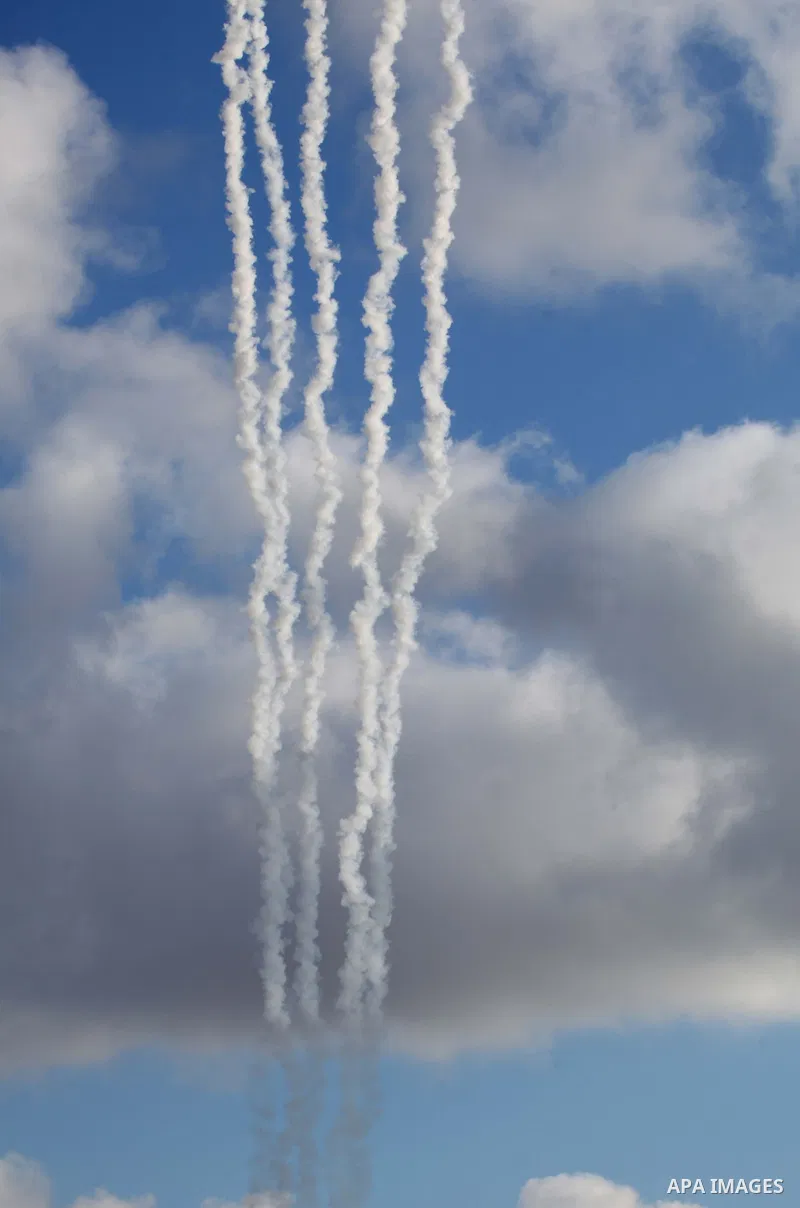 A picture taken in July 14, 2014 shows smoke trails as a rockets are launched to the southern Israel. Israeli forces on Saturday pressed ahead with a ground offensive in the Gaza Strip, where Palestinian militants kept f...