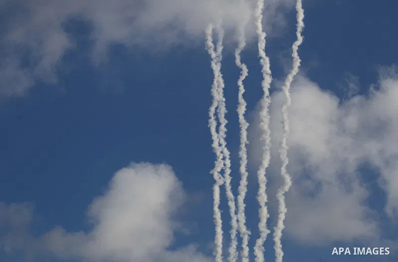 A picture taken in July 14, 2014 shows smoke trails as a rockets are launched to the southern Israel. Israeli forces on Saturday pressed ahead with a ground offensive in the Gaza Strip, where Palestinian militants kept f...