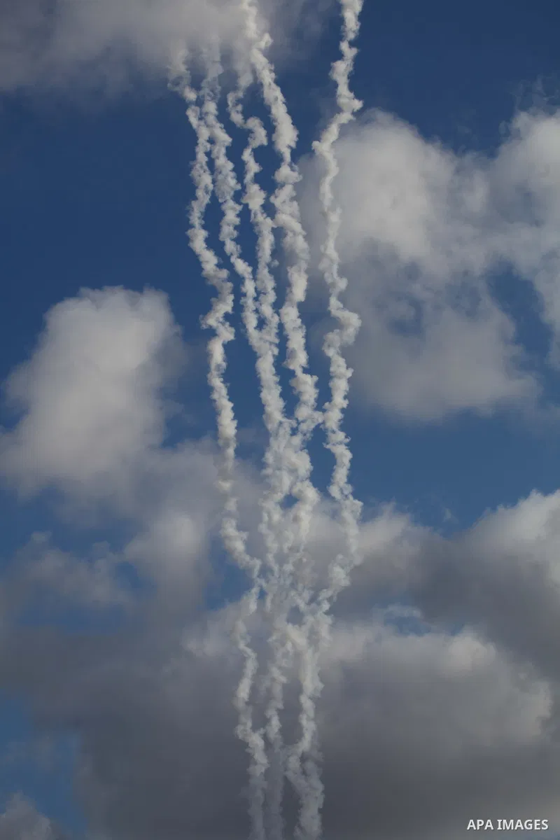 A picture taken in July 14, 2014 shows smoke trails as a rockets are launched to the southern Israel. Israeli forces on Saturday pressed ahead with a ground offensive in the Gaza Strip, where Palestinian militants kept f...
