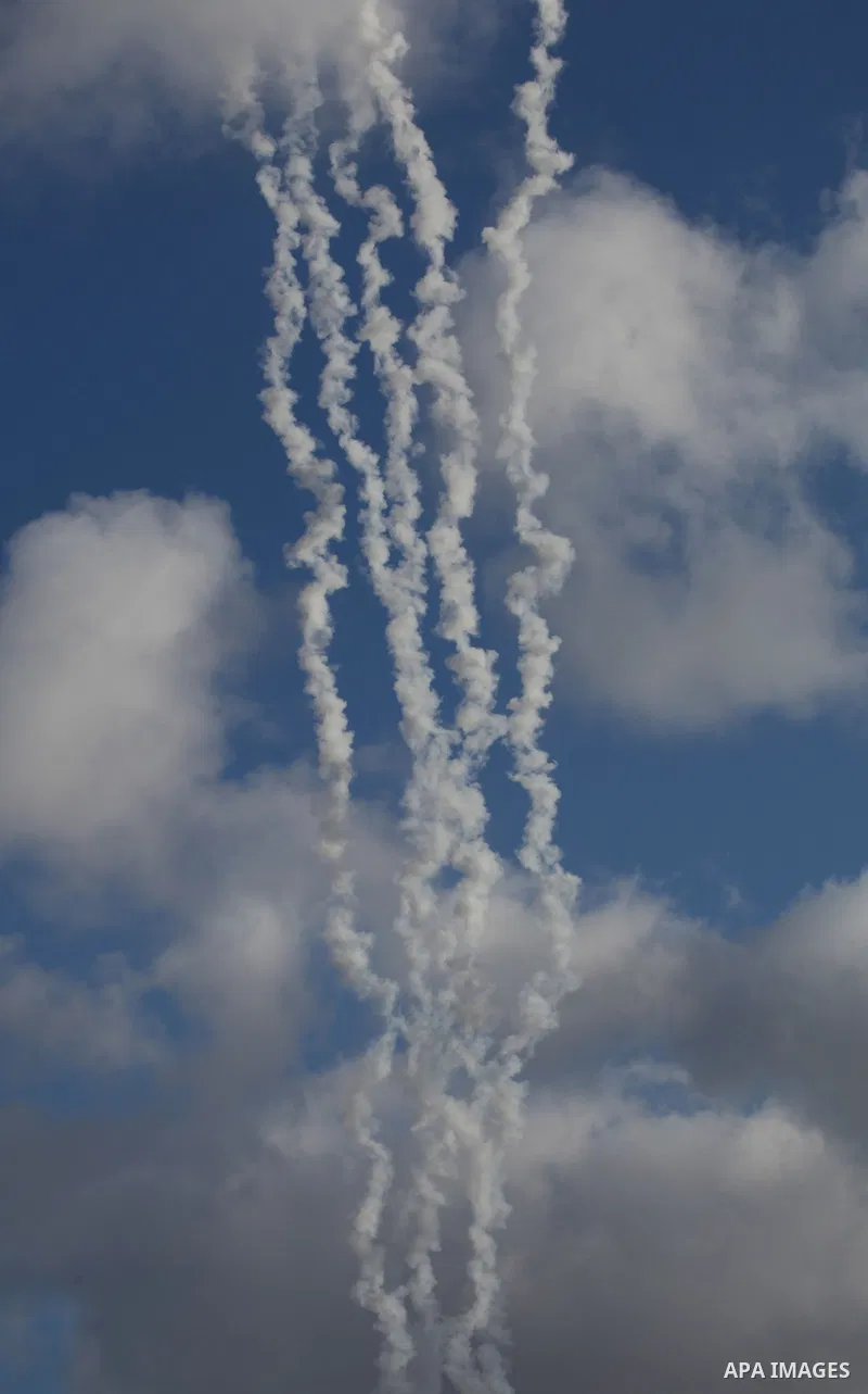 A picture taken in July 14, 2014 shows smoke trails as a rockets are launched to the southern Israel. Israeli forces on Saturday pressed ahead with a ground offensive in the Gaza Strip, where Palestinian militants kept f...