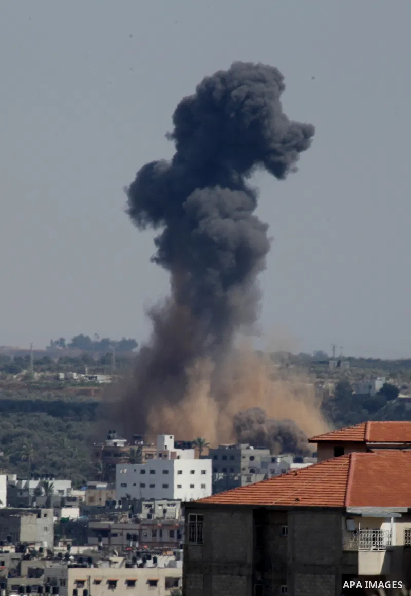 A picture taken in July 14, 2014 shows smoke rising after an Israeli air strike in Gaza City. Israeli forces on Saturday pressed ahead with a ground offensive in the Gaza Strip, where Palestinian militants kept firing ro...