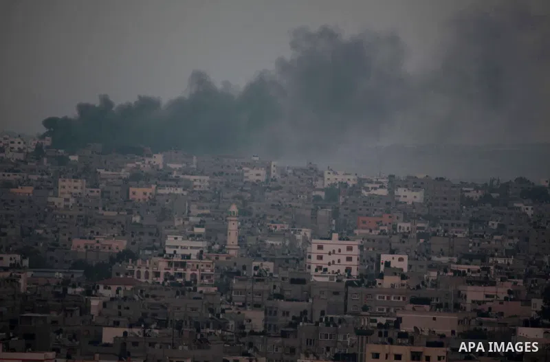 Smoke rises after an Israeli airstrike in Al Shejaeiya neighbourhood during a military operation in eastern Gaza City, 22 July 2014. The number of Palestinians to have died rose by at least 50 since late 21 July, bringin...