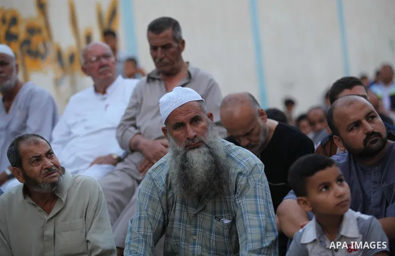 Palestinians attend the Eid al-Fitr prayer in Gaza City on July 28, 2014.The U.N. Security Council agreed on a statement on Sunday urging Israel, Palestinians and Islamist Hamas militants to implement a humanitarian truc...
