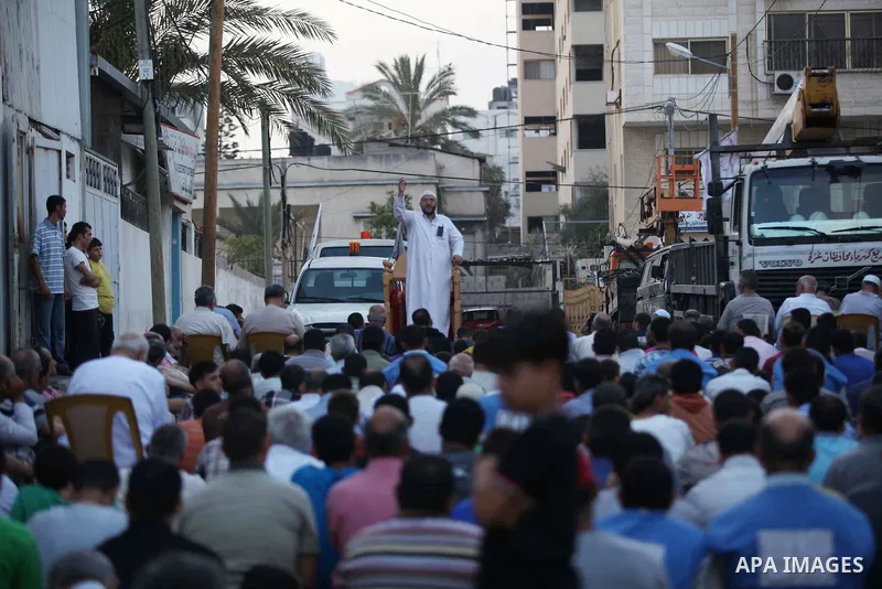 Palestinians attend the Eid al-Fitr prayer in Gaza City on July 28, 2014.The U.N. Security Council agreed on a statement on Sunday urging Israel, Palestinians and Islamist Hamas militants to implement a humanitarian truc...