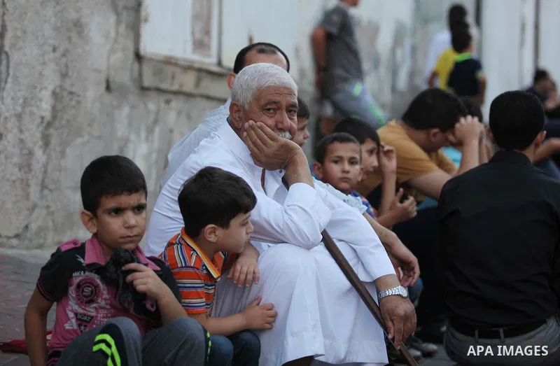 Palestinians attend the Eid al-Fitr prayer in Gaza City on July 28, 2014.The U.N. Security Council agreed on a statement on Sunday urging Israel, Palestinians and Islamist Hamas militants to implement a humanitarian truc...