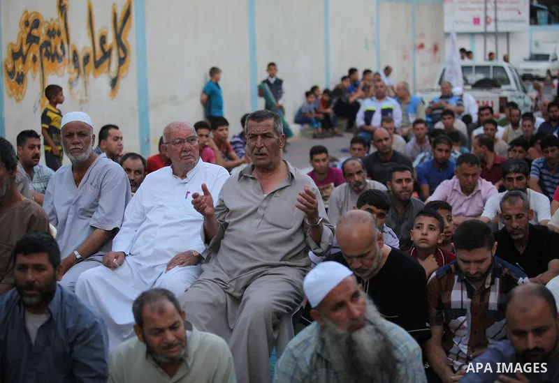 Palestinians attend the Eid al-Fitr prayer in Gaza City on July 28, 2014.The U.N. Security Council agreed on a statement on Sunday urging Israel, Palestinians and Islamist Hamas militants to implement a humanitarian truc...