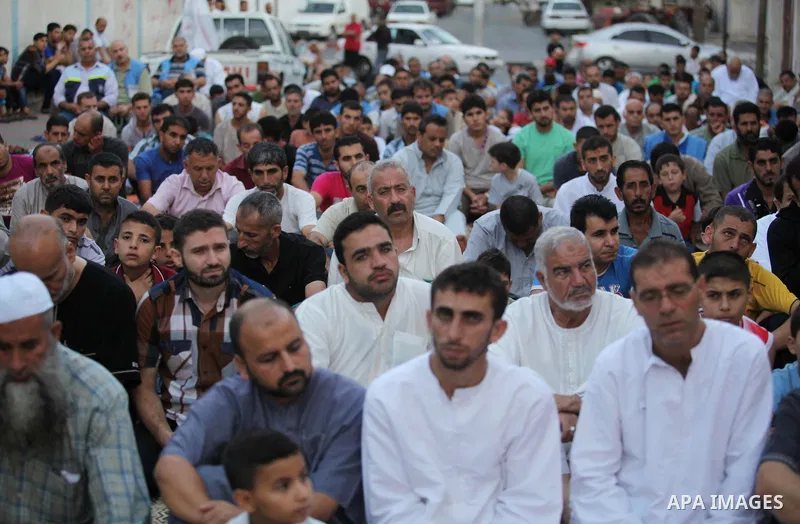 Palestinians attend the Eid al-Fitr prayer in Gaza City on July 28, 2014.The U.N. Security Council agreed on a statement on Sunday urging Israel, Palestinians and Islamist Hamas militants to implement a humanitarian truc...