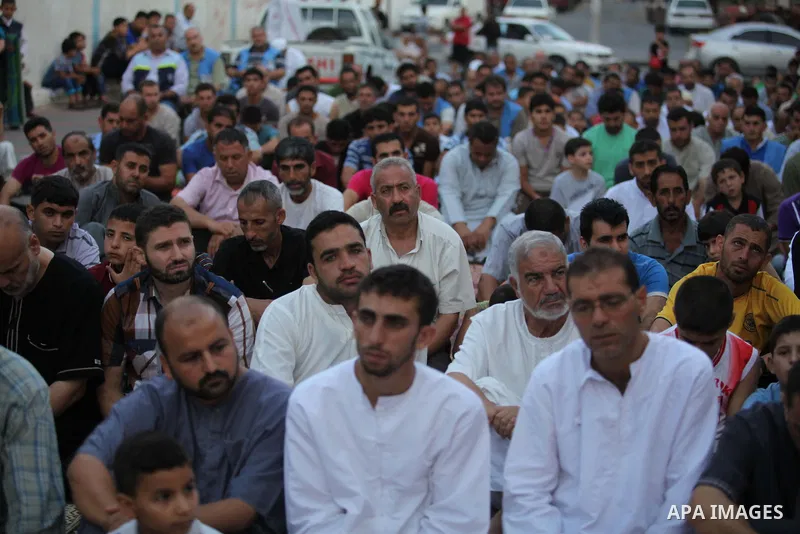 Palestinians attend the Eid al-Fitr prayer in Gaza City on July 28, 2014.The U.N. Security Council agreed on a statement on Sunday urging Israel, Palestinians and Islamist Hamas militants to implement a humanitarian truc...