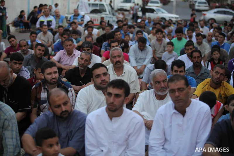 Palestinians attend the Eid al-Fitr prayer in Gaza City on July 28, 2014.The U.N. Security Council agreed on a statement on Sunday urging Israel, Palestinians and Islamist Hamas militants to implement a humanitarian truc...