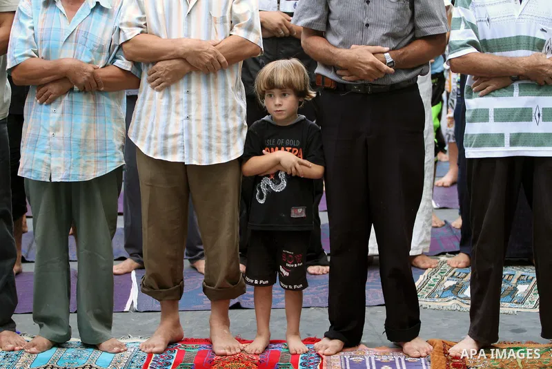 Displaced Palestinians attend the Eid al-Fitr prayer at a United Nations school, in Gaza City on July 28, 2014. The U.N. Security Council agreed on a statement on Sunday urging Israel, Palestinians and Islamist Hamas mil...