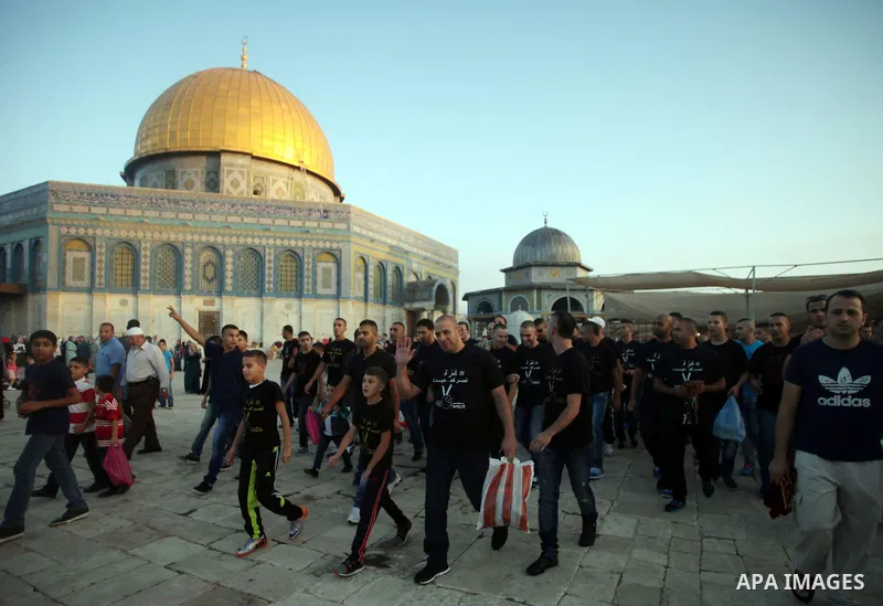 Palestinian protesters take part in a protest against the Israeli military operation on Gaza Strip following the Eid al-Fitr prayer at al-Aqsa mosque in Jerusalem's Old City on July 28, 2014. Muslims around the world are...
