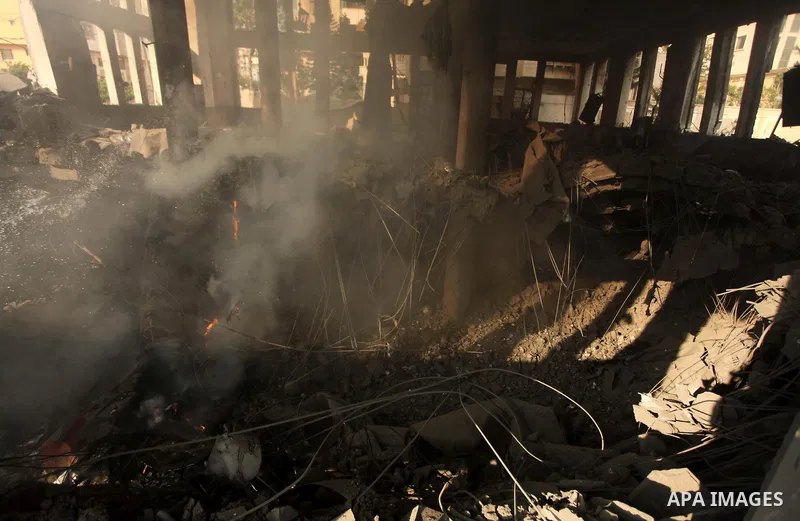 Palestinian firefighters extinguish fire at a mosque after it was hit by an Israeli air strike, on July 29, 2014, in Gaza City. Bloodshed in and around Gaza surged with strikes killing at least 13 Palestinians, a day aft...