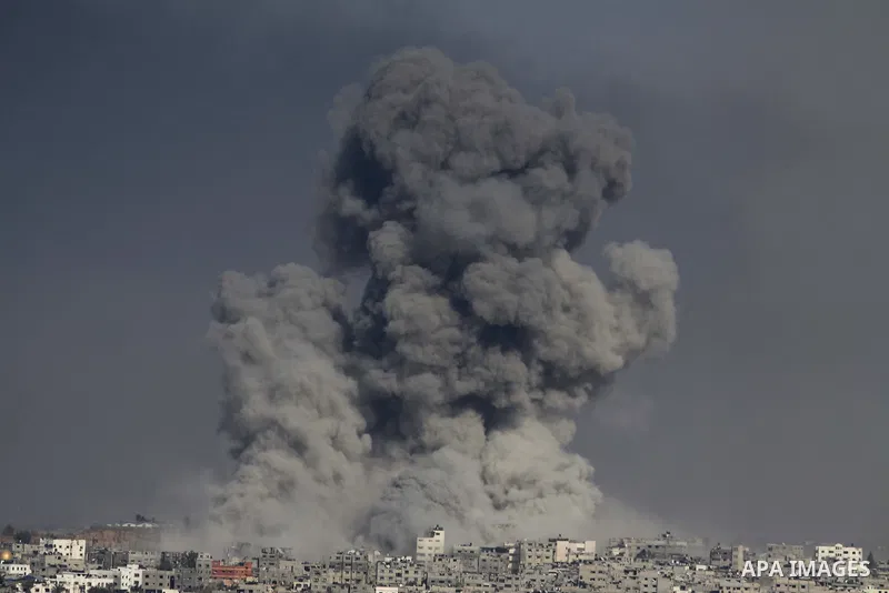 Smoke from the explosion of an Israeli strike rise over Gaza City, Tuesday, July 29, 2014. Israel escalated its military campaign against Hamas on Tuesday, striking symbols of the group's control in Gaza and firing tank...