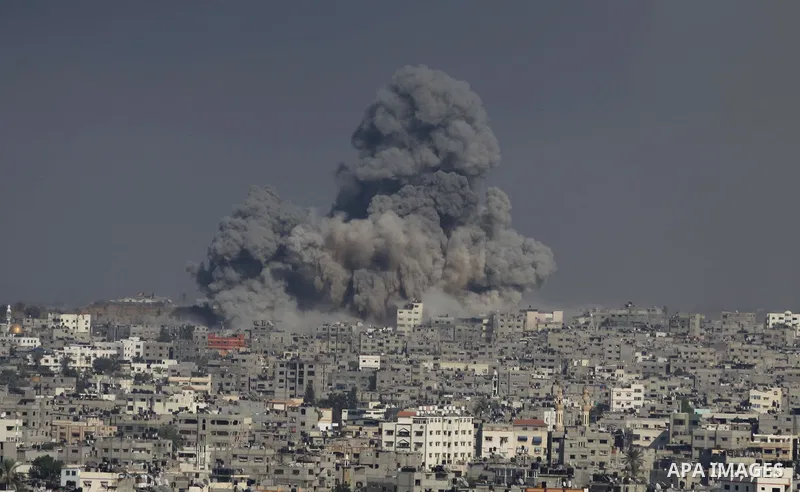 Smoke from the explosion of an Israeli strike rise over Gaza City, Tuesday, July 29, 2014. Israel escalated its military campaign against Hamas on Tuesday, striking symbols of the group's control in Gaza and firing tank...