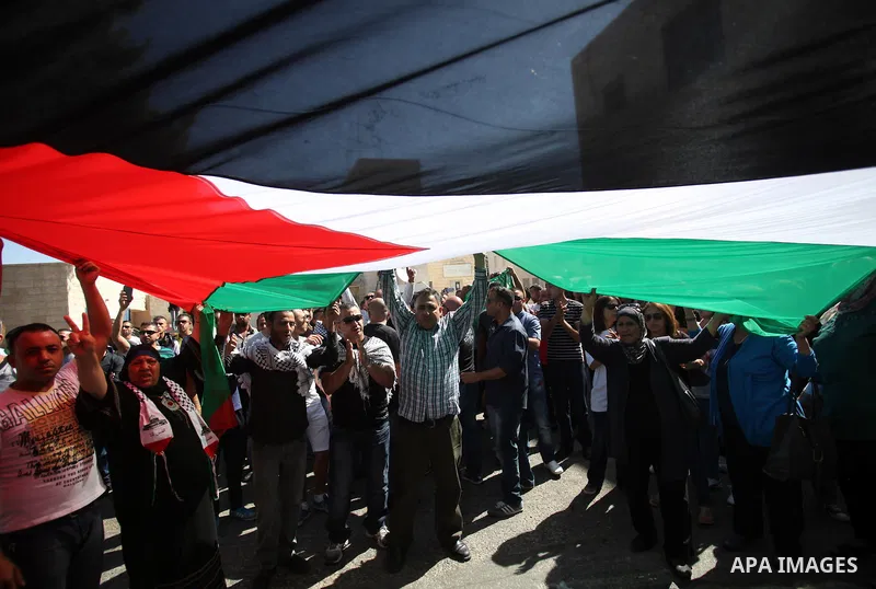 Palestinians mourns two body of Zehir Al-Najar 7, and Ahmed Abu Baler 19, from the Gaza Strip, during thier funeral in East Jerusalem, on July 30, 2014 after they died from injuries sustained following an Israeli militar...