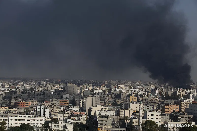 Smoke from the explosion of an Israeli strike rise over Gaza City, Wednesday, July 30, 2014, amid Israel's heaviest air and artillery assault in more than three weeks of Israel-Hamas fighting. Photo by Ashraf Amra