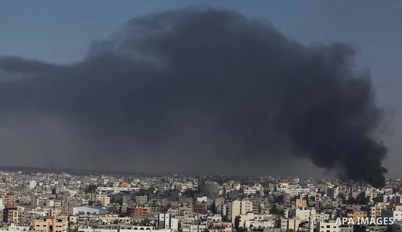Smoke from the explosion of an Israeli strike rise over Gaza City, Wednesday, July 30, 2014, amid Israel's heaviest air and artillery assault in more than three weeks of Israel-Hamas fighting. Photo by Ashraf Amra