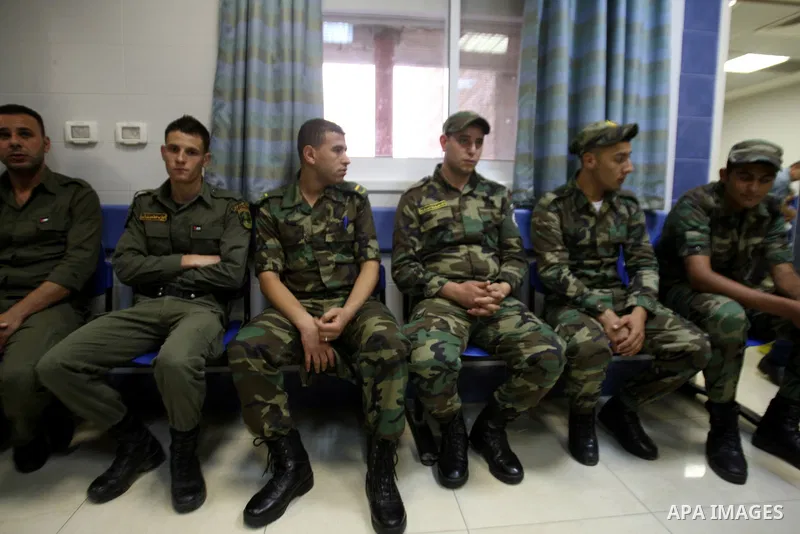 Palestinian policemen donate blood during a campaign of blood donation for Gaza strip, at hospital in the West Bank city of Nablus, on July 31, 2014. At least 10 people were killed in fresh Israeli strikes in central and...