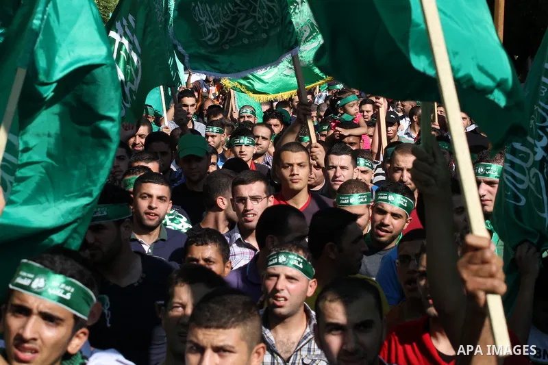Hamas supporters shout slogans against the Israeli military action in Gaza, during a demonstration in the West Bank city of Nablus, Thursday, July 31, 2014. Photo by Nedal Eshtayah