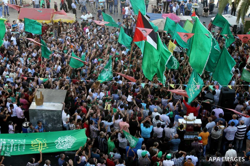 Hamas supporters shout slogans against the Israeli military action in Gaza, during a demonstration in the West Bank city of Nablus, Thursday, July 31, 2014. Photo by Nedal Eshtayah