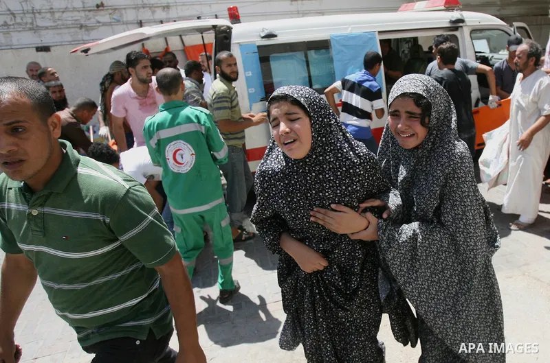 An injured Palestinian woman receives medical treatment at al-Najar hospital in Rafah in the southern of Gaza strip, following an Israeli military strike on August 1, 2014. Egypt told Palestinian officials it is delaying...