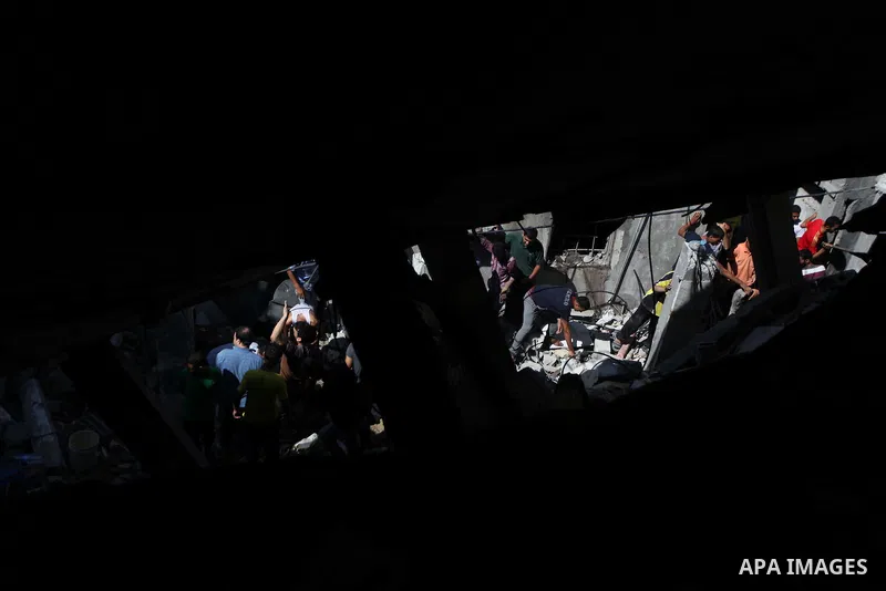 Palestinians inspect the destroyed house, which witnesses said was heavily hit by Israeli air strikes, in Nusseirat in the central Gaza Strip, August 1, 2014. A Gaza ceasefire crumbled only hours after it began on Friday...