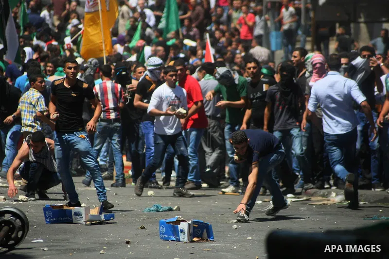 Palestinians turn out to protest in the West Bank city of Hebron, 01 August 2014. Hamas had called for a 'Day of rage' in the West Bank as protests broke out in many places in solidarity with the Hamas movement whose mil...