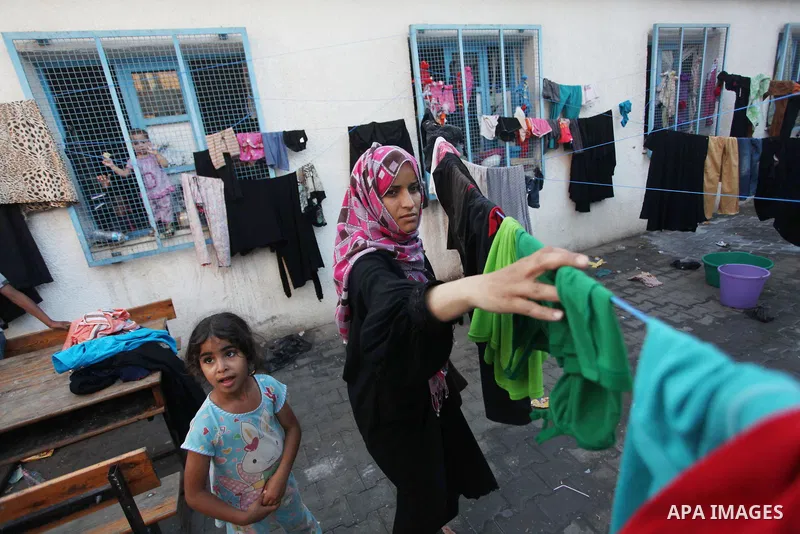 Displaced Palestinians take shelter at the Abu Hussien United Nations school in the Jabalia refugee camp in the northern Gaza Strip on August 2, 2014. The Israeli army gave a first indication it was ending operations in...
