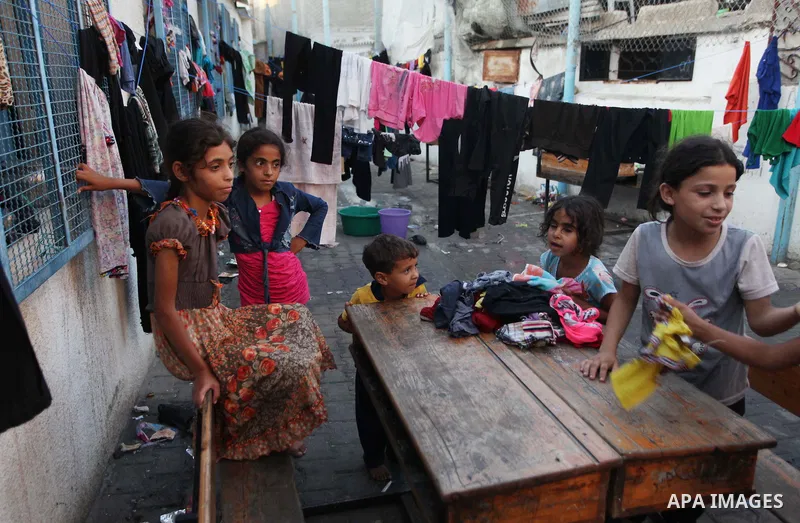 Displaced Palestinians take shelter at the Abu Hussien United Nations school in the Jabalia refugee camp in the northern Gaza Strip on August 2, 2014. The Israeli army gave a first indication it was ending operations in...
