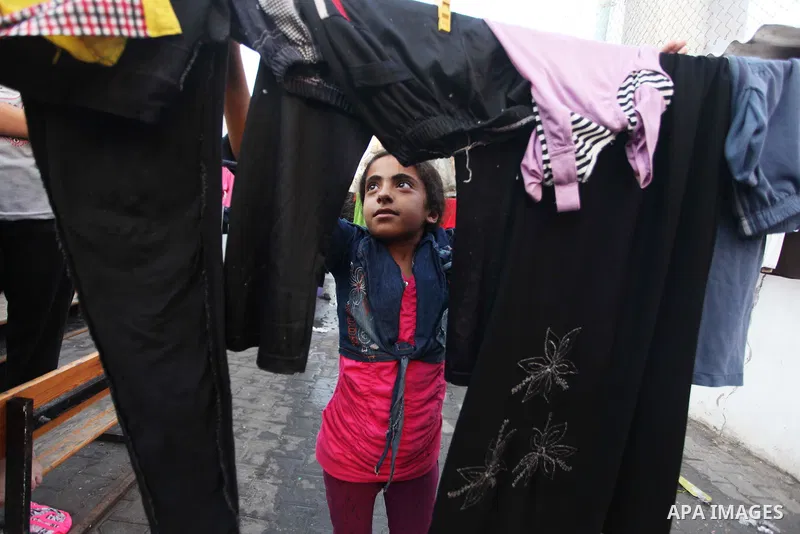 Displaced Palestinians take shelter at the Abu Hussien United Nations school in the Jabalia refugee camp in the northern Gaza Strip on August 2, 2014. The Israeli army gave a first indication it was ending operations in...
