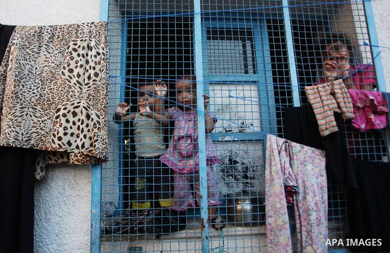 Displaced Palestinians take shelter at the Abu Hussien United Nations school in the Jabalia refugee camp in the northern Gaza Strip on August 2, 2014. The Israeli army gave a first indication it was ending operations in...
