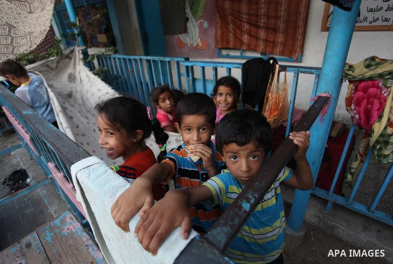 Displaced Palestinians take shelter at the Abu Hussien United Nations school in the Jabalia refugee camp in the northern Gaza Strip on August 2, 2014. The Israeli army gave a first indication it was ending operations in...