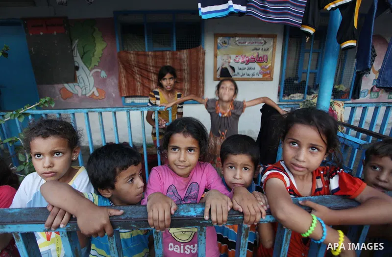 Displaced Palestinians take shelter at the Abu Hussien United Nations school in the Jabalia refugee camp in the northern Gaza Strip on August 2, 2014. The Israeli army gave a first indication it was ending operations in...